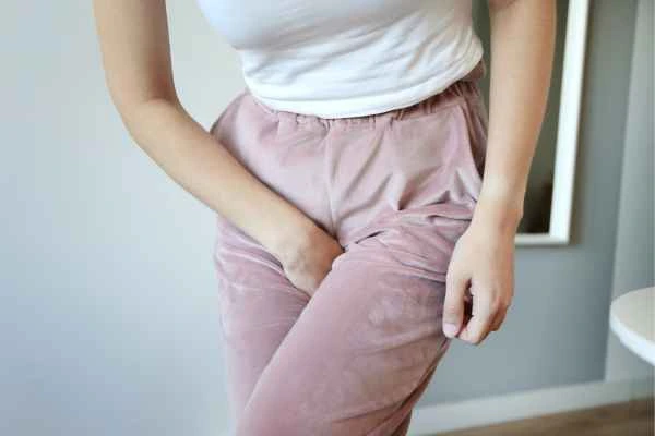woman running for the toilet because of urinary incontinence Kensington Gardens